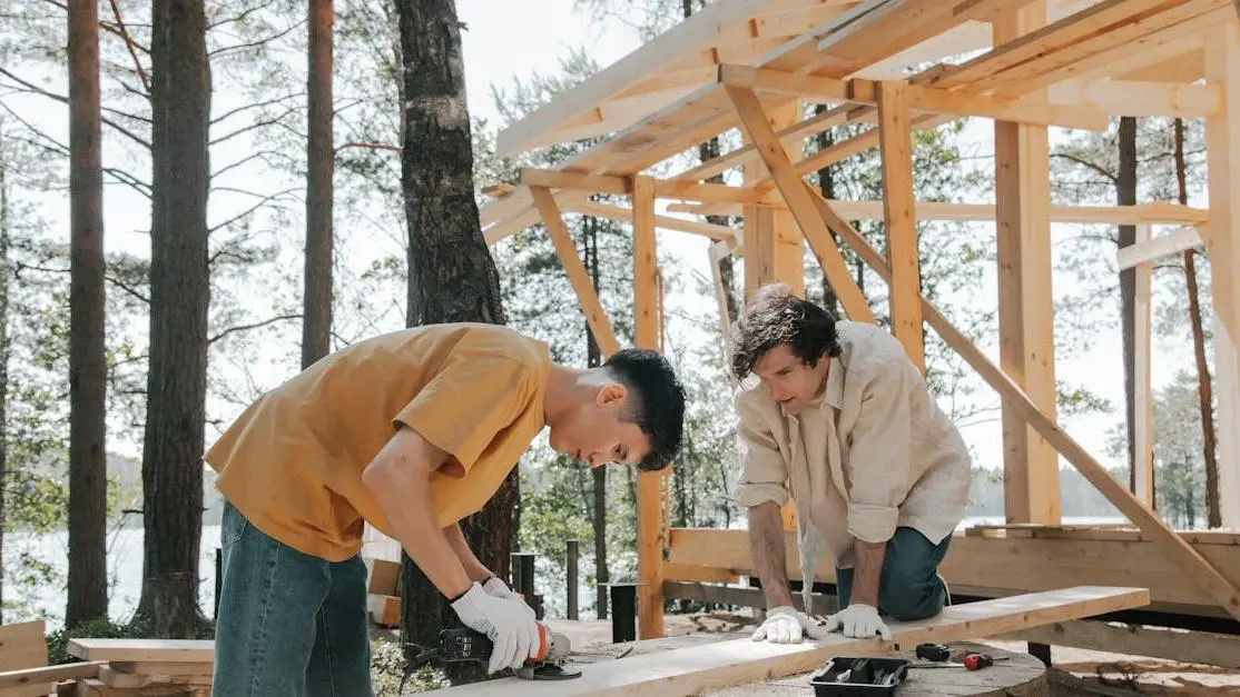 Habitat for Humanity volunteer opportunities: carpenters building a wooden frame in a forest