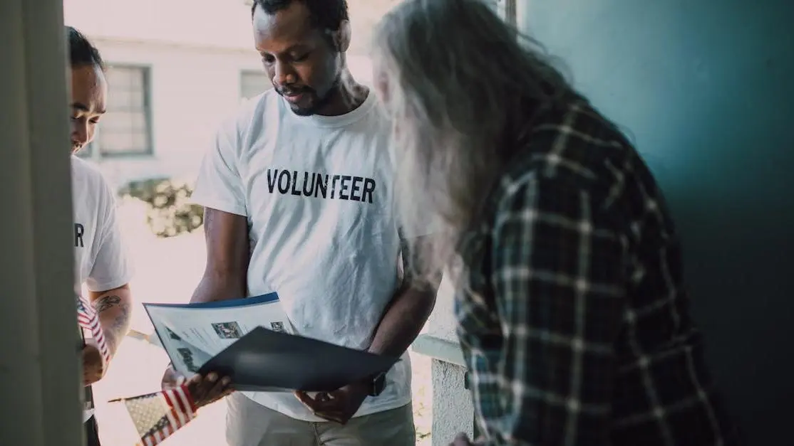 Samaritan volunteers visit a home to provide community support and review documents