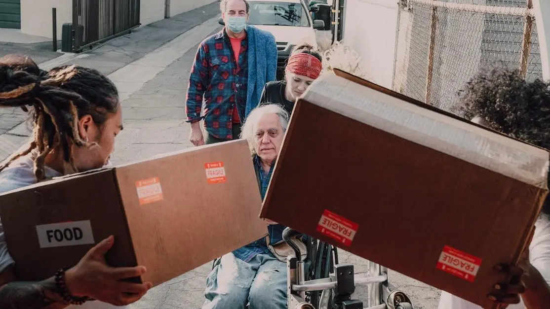 Volunteers distributing food and supplies—volunteer work for resume examples showing community service