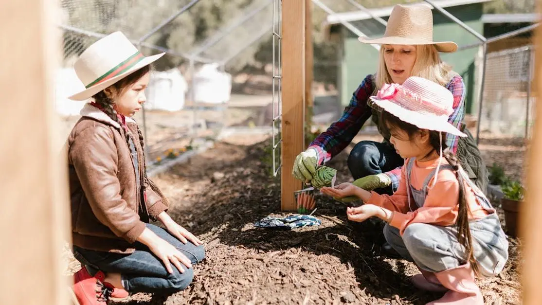 Woman leading kids in outdoor gardening lesson, volunteering for education on a sunny farm